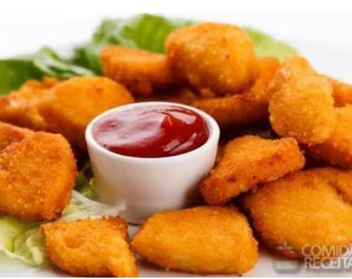 Porção de Nuggets de Frango (12 unidades)...